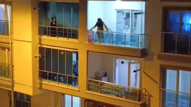 Ankara’da genç kadın balkondan eşyaları yola attı